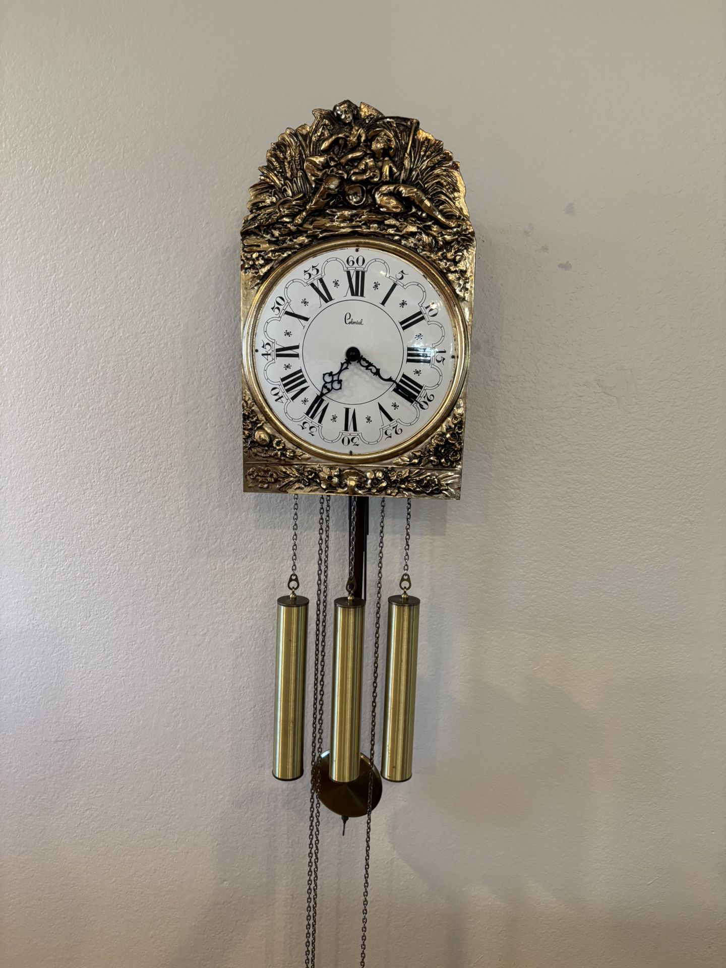 Colonial of Zeeland Wall Clock , Working and Chiming Every 15 Minutes .