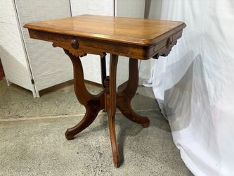 Victorian Style Parlor Table with Ornate Carved Pedestal and Burl Wood Inlay