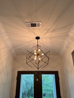 Geometric black and gold light fixture