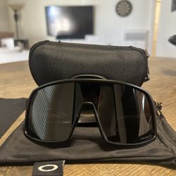 Oakley Sutro, Black & White Comes with glasses case, glasses bag, and lens cleaning cloth