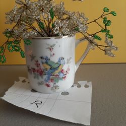 Demitasse cup W Beaded flowers Seen For $18