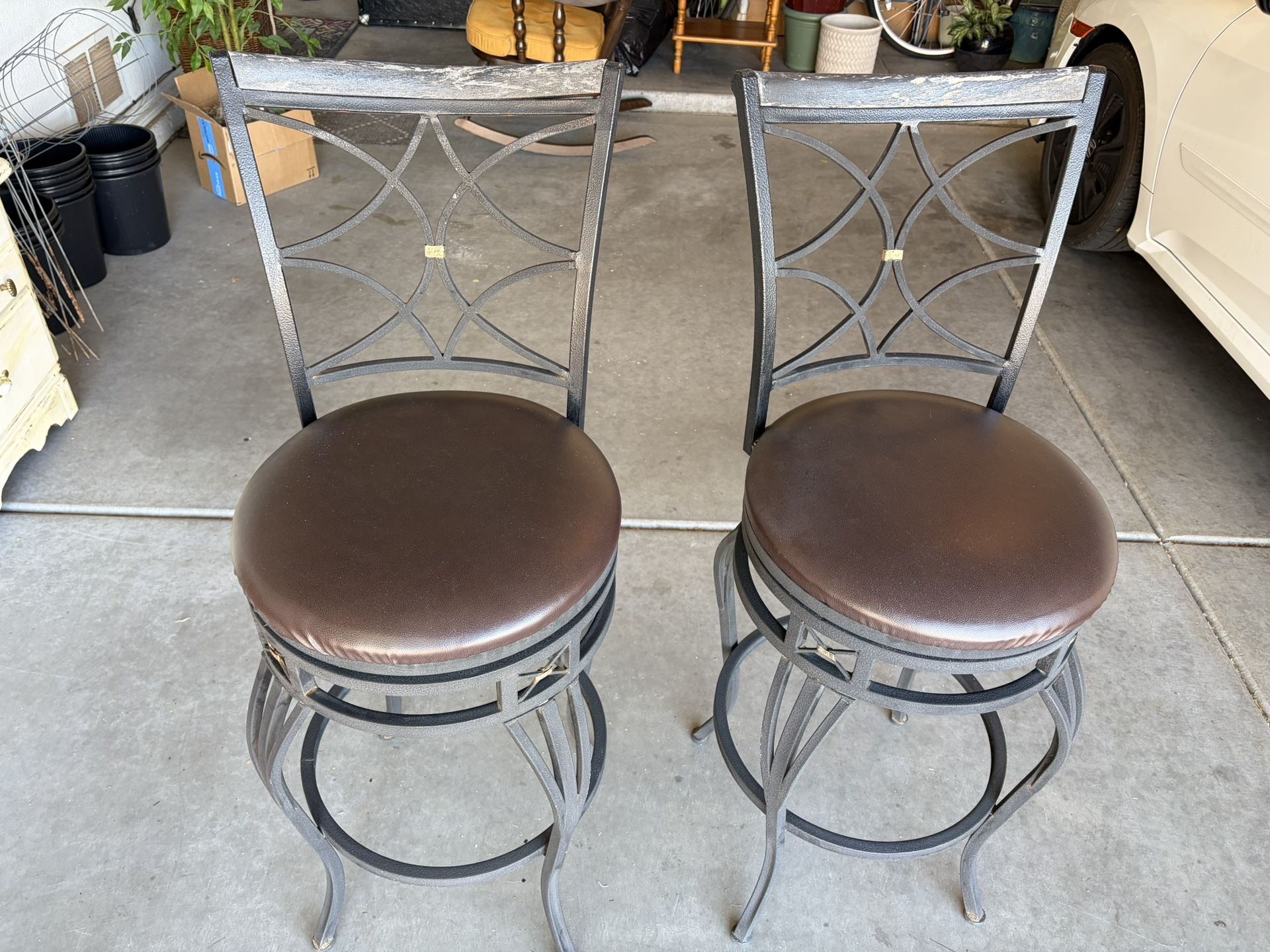 2 Swivel Iron Bar Stools