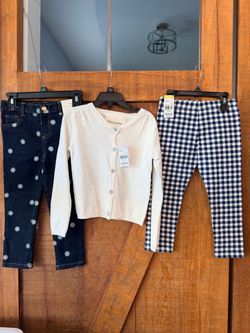 4T Girl’s Outfit (1 white cardigan, 1 pair of jeans, and 1 pair of capris)