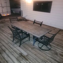 Large Rectangle Heavy Stone Patio Table With 2 Swivel And  2 Standard Chairs And 8 Cushions With Storage Box
