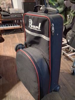 Pearl Snare drum, bell kit, and rolling travel bag