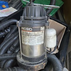 Rigid submersible sump pump