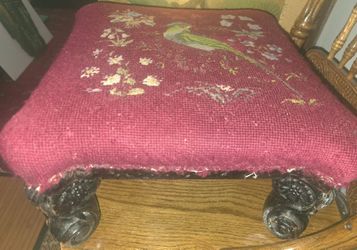 Antique Victorian floral needlepoint footstool in burgundy with parrot & Handcarved hardwood  legs 14" square