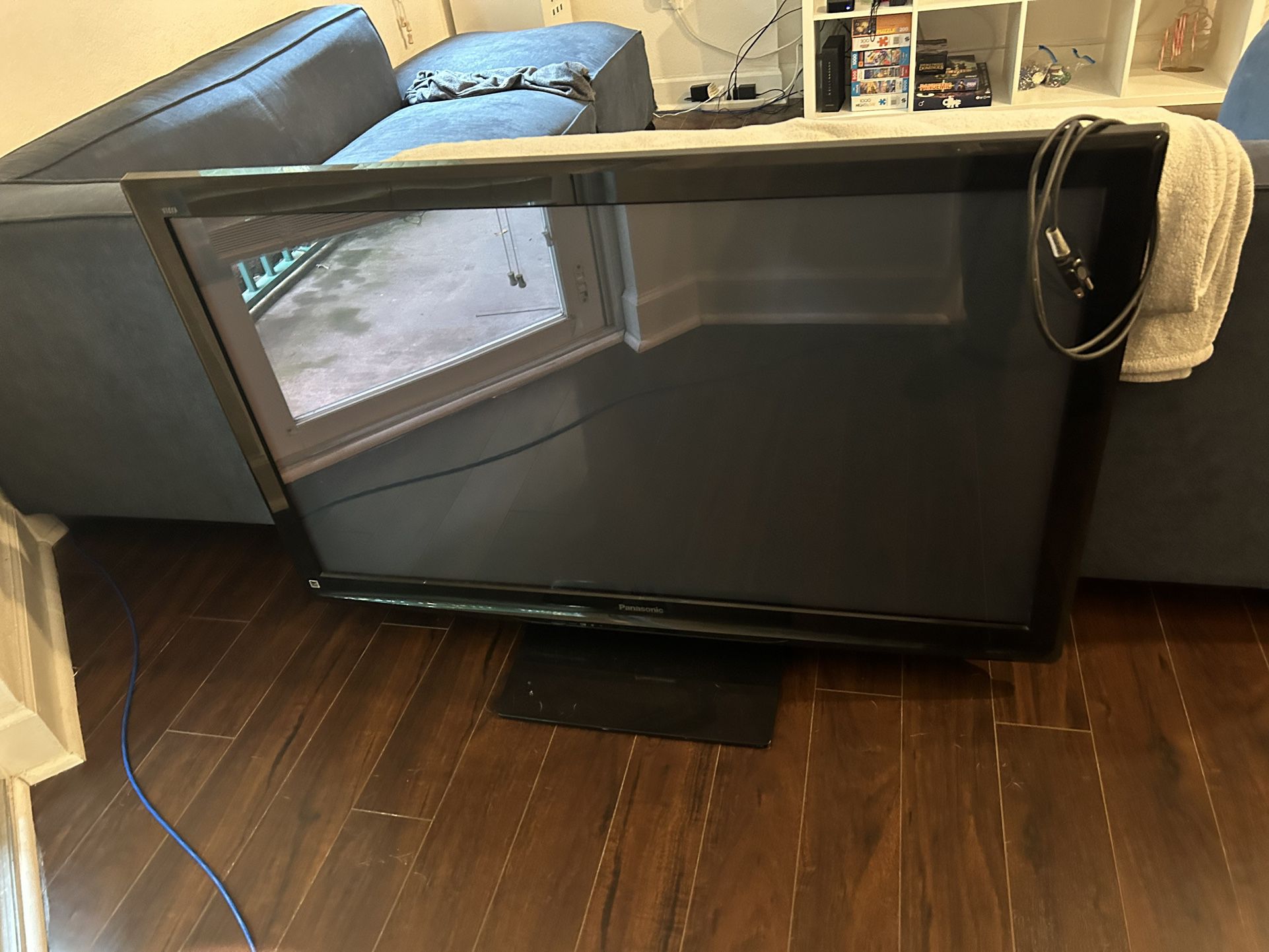 55” Panasonic TV and Apple TV With Remote Control 