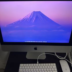 2015 iMac (27-inch, 5K Retina display) with an i5 processor, model number c02rp03kgg78