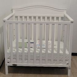 White Graco Stella  Mini Crib 4 In 1