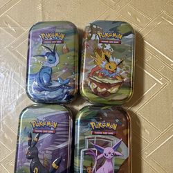 Pokemon Prismatic Tins