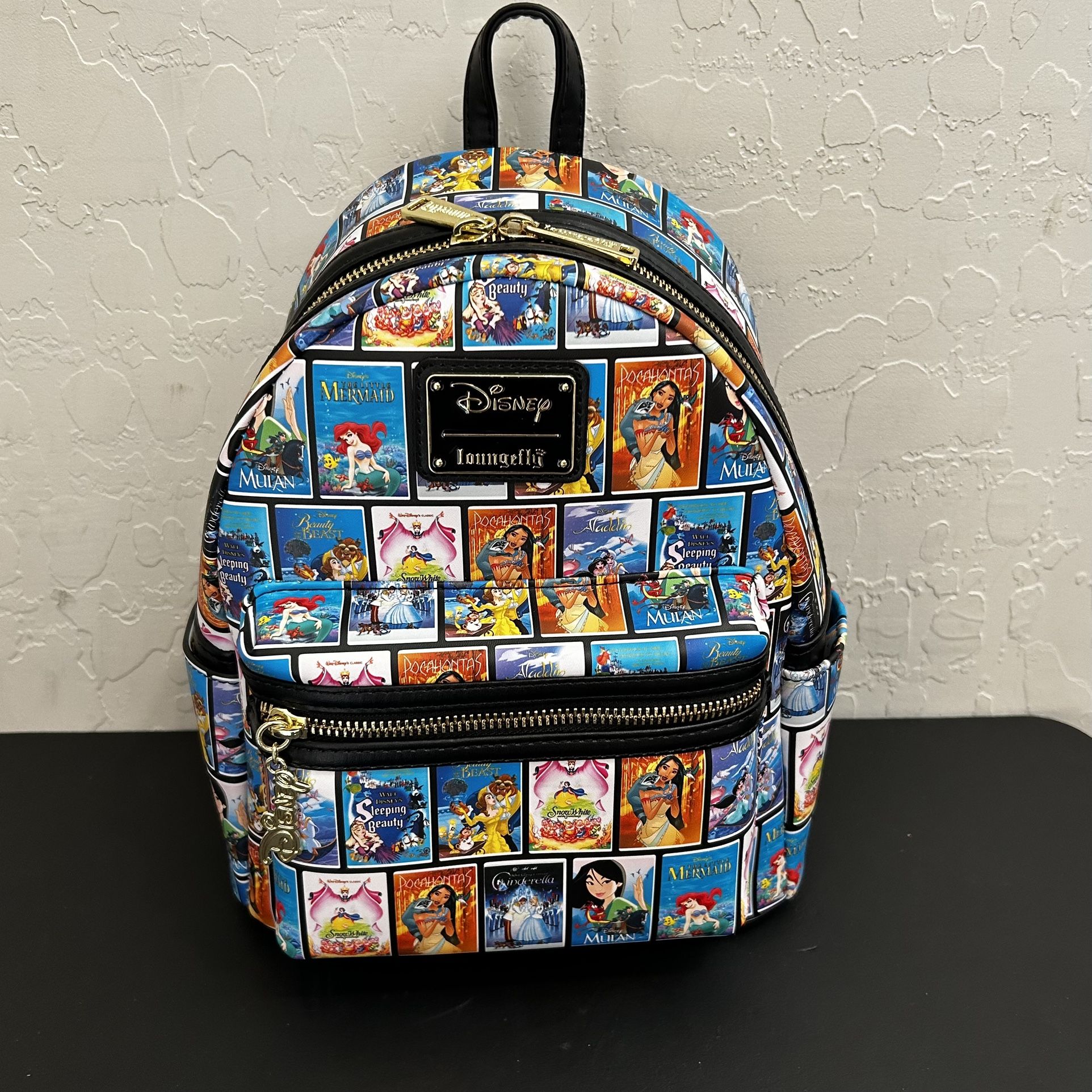 disney princess vhs tapes loungefly mini backpack NEW Loungefly Disney Princess VHS Tapes All Over Print Mini Backpack &  Briefcases