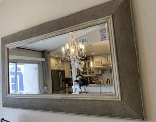 Gorgeous huge wall mirror. Metal. Very heavy.