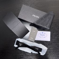 PRADA LUXURY GLASSES  – Elegant Italian Design