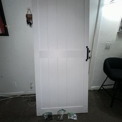 Manufactured Paneled Wood Barn Door 