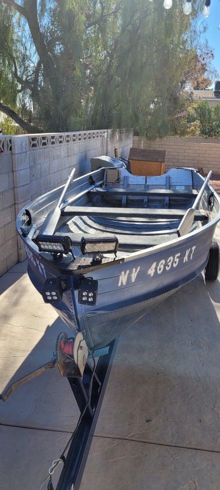 Aluminum 14 FT. Row Boat With new Oars & Trailer