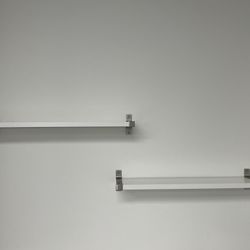 White Shelving With Stainless Steel Brackets. Each L 32” W 8”