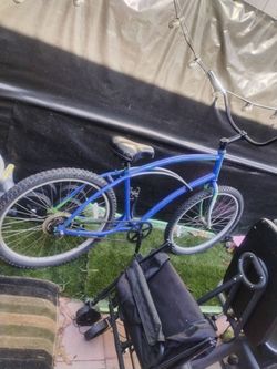 blue beach cruiser bicycle
