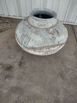 Decorative clay pot with southwest desert design