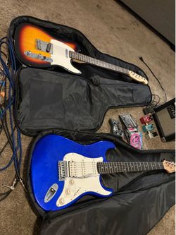 2 electric guitars and accessories