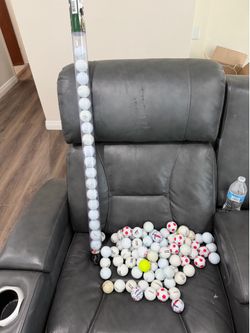 Golf balls and practice holder