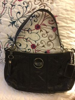 Black coach, gentle used, 35$ , pick up only.
