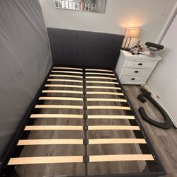 Queen Sized Upholstered Bed