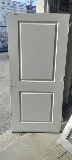 Exterior solid wood very heavy two panel single door 36x79.5