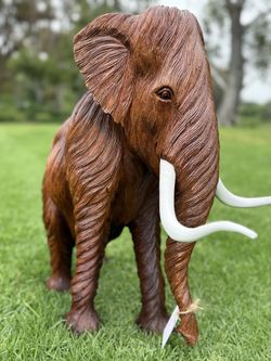 hand carved wooden mammoth 🦣 statue 