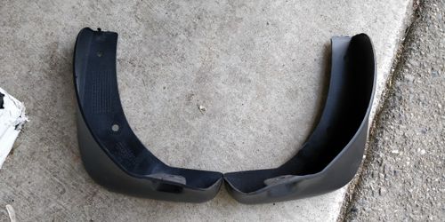 2016 Nissan Versa rear mud flaps OEM