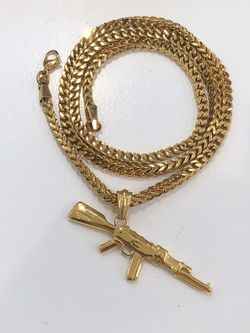 Brand new 14k gold finish Ak47 pendant with stainless steel Franco Chain ! Doesn’t turn your Neck Green