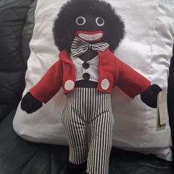  black raggedy Ann like doll.