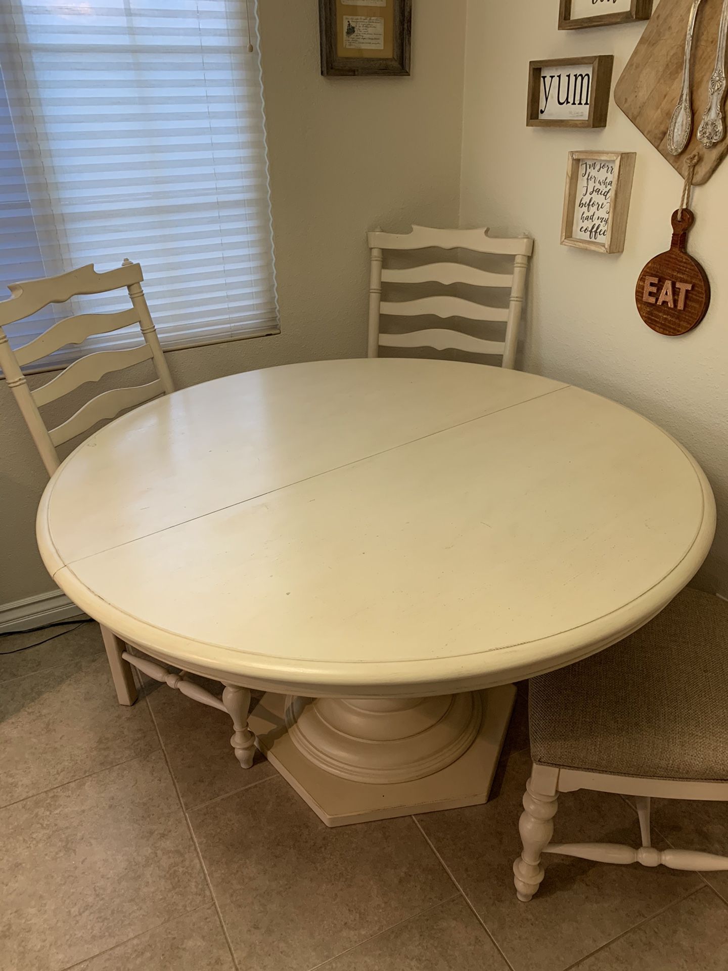 Cream antiqued kitchen table, seats 4-6