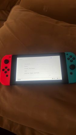 Nintendo Switch with Neon Red and Teal Joy-Cons