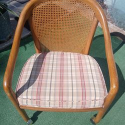 Vintage Cane Chair On Casters 