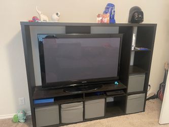 Entertainment center with cube storage