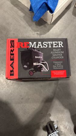 REMASTER 2-BOLT GM/FORD MASTER CYL ASSEMBLY, BLACK, 1IN BORE, LEFT PORT.