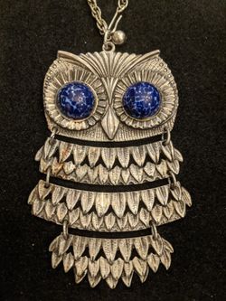 $10. Vintage Goldette navy blue eyes owl necklace. Signed Goldette. Necklace is 22 inches. Pendant is 3.75 inches long and 2.5 inches wide.