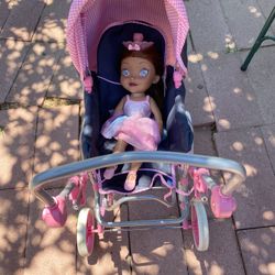carrito y muñeca