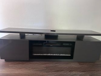 Entertainment center with LED light and fire place
