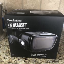 * New - VR headset with built-in headphones