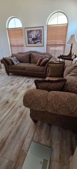Sofa and love seat, brown floral fabric