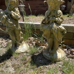 Outdoor two statue, girl and boy for both