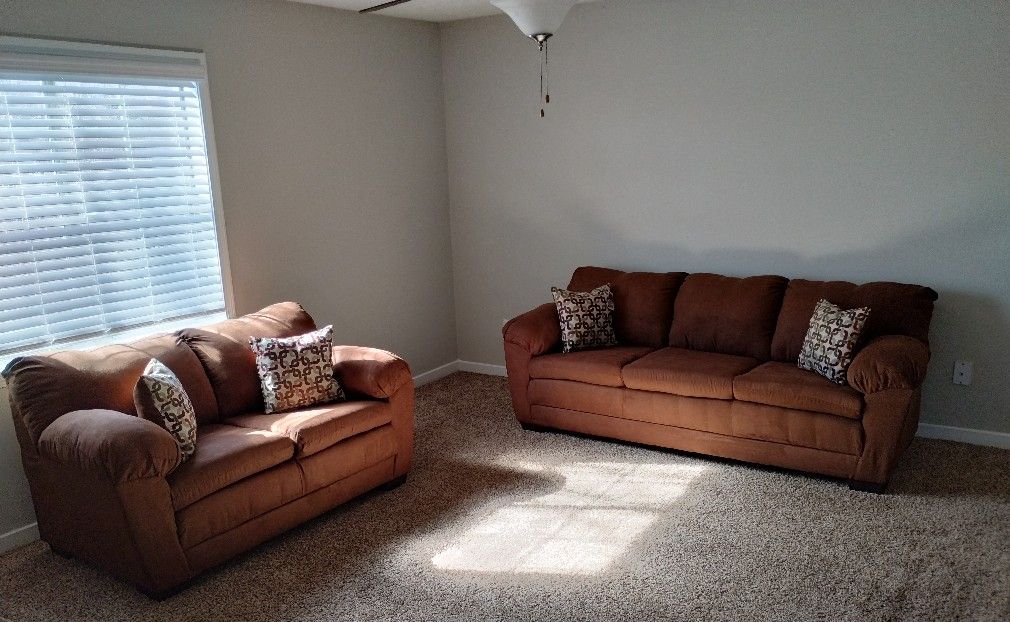 Adobe Chocolate Loveseat And Sofa W/ Pillows