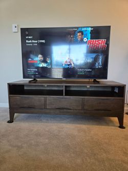 SIMPLIHOME TV STAND.