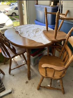 Table with leaf and 6 chairs. Great DIY project.