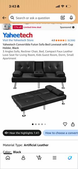 Black futon couch with cupholders