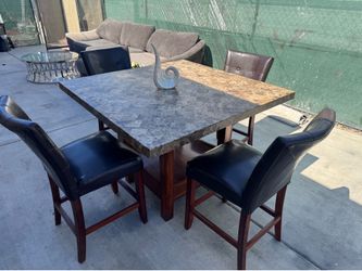 High marble dining table with 4 chairs ..Free delivery available 🚛🚛