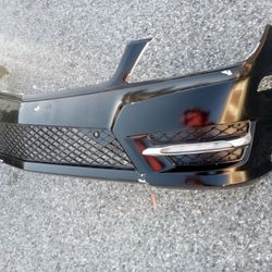 2011-2014 Mercedes C250/300 Front Bumper With Fog Lights And Fog Lights Mesh Oem.   