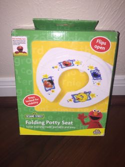 Sesame Street Folding Potty Seat for toilet training!
